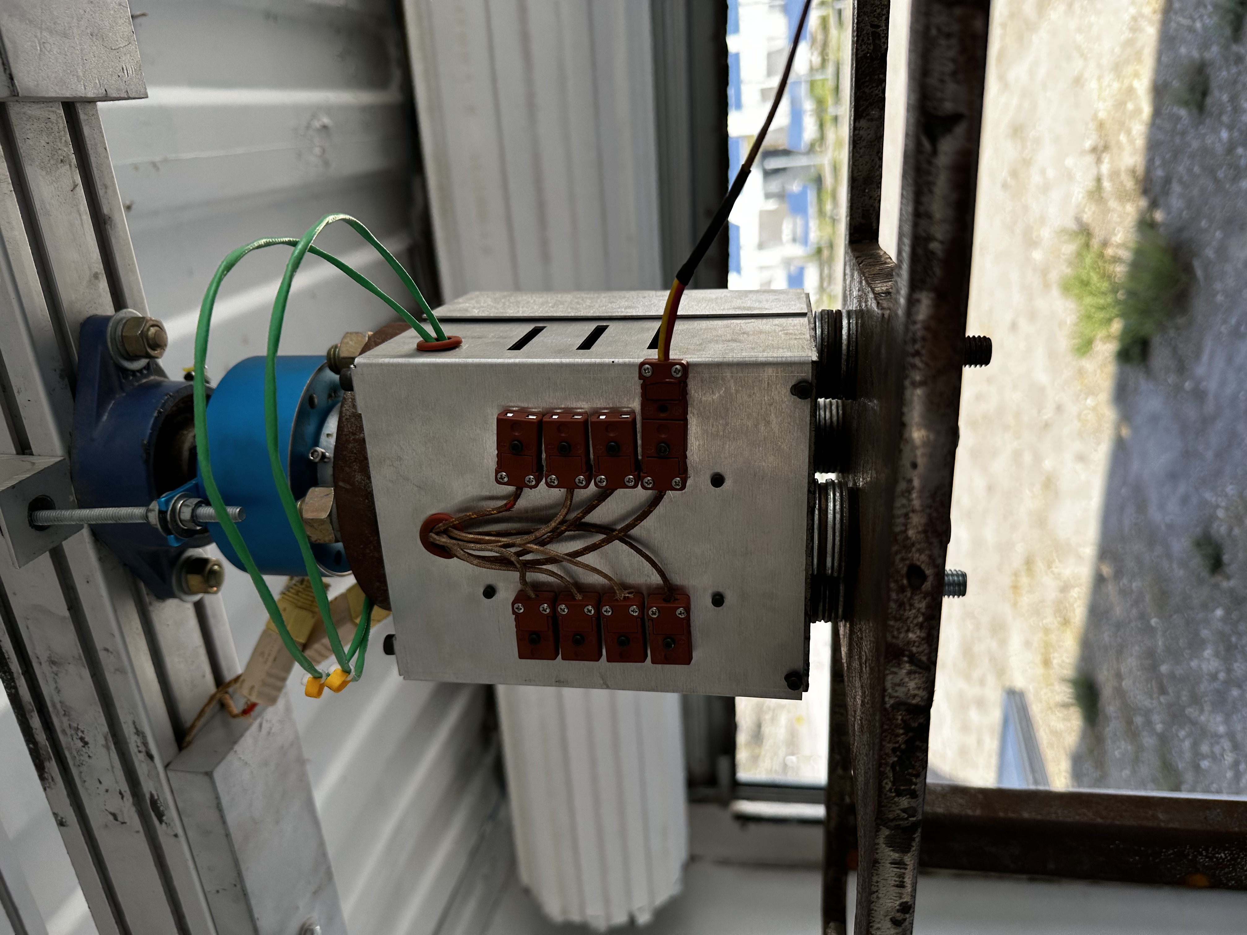 Temperature sensor expansion project hardware with circuit board and sensor components visible in frame.